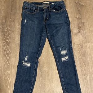 Levi 711 distressed skinny jeans